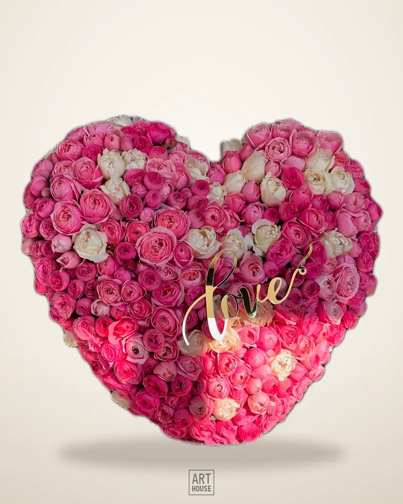Heart floral arrangement on a base